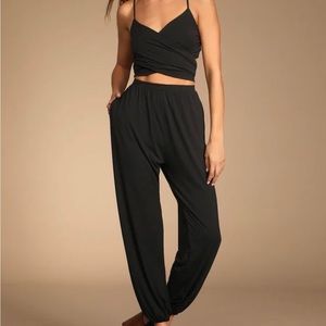 Black wrap jumpsuit. NWT